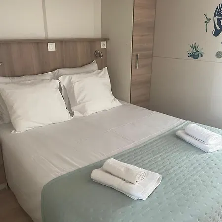 Les De La A Santa Trinita *